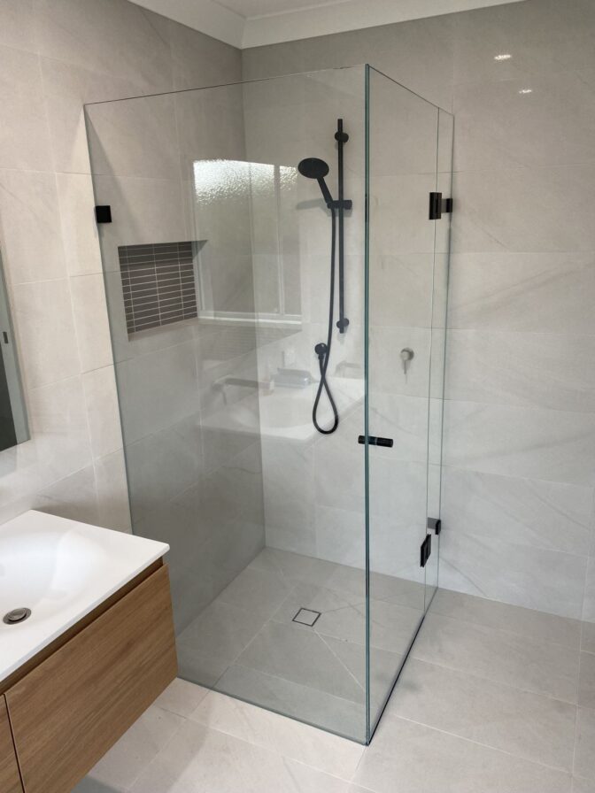 opti glass frameless with black fittings