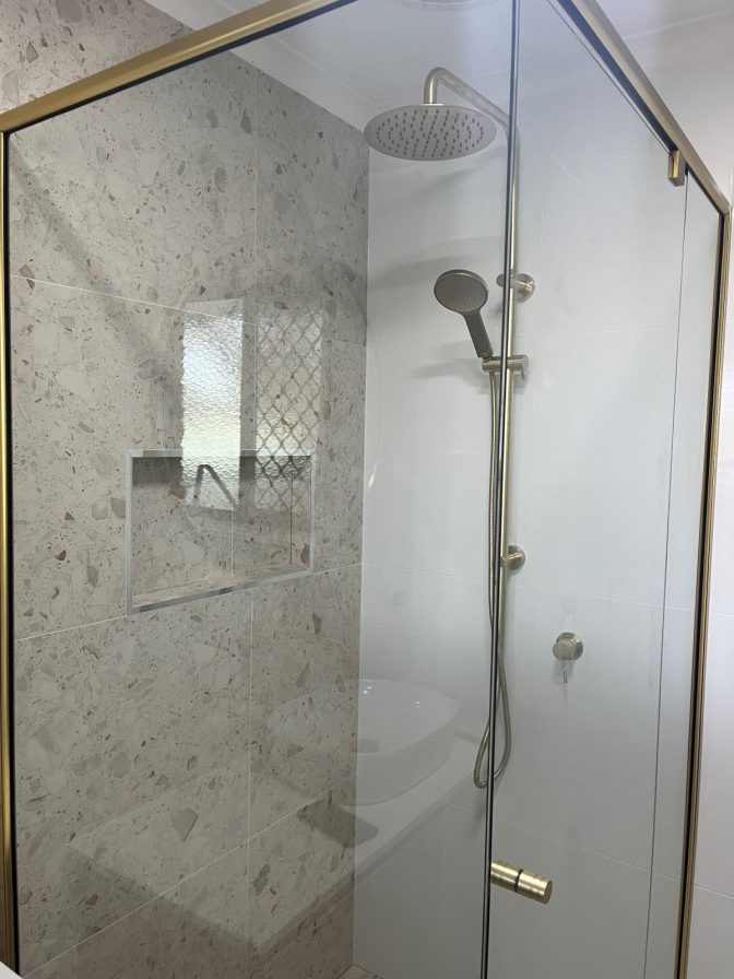 semi frameless shower screen gold frame