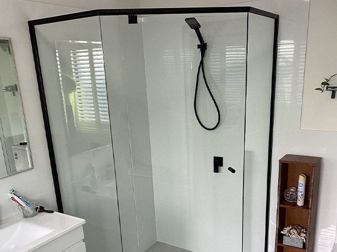 black semi frameless shower screens